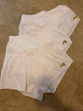 Tracksmith White Women's Running Shorts with Gold Logo Accent